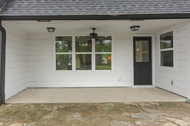 9222 New Forest Rd, Spring, TX 77379 - entrance to property with roof with shingles and a ceiling fan