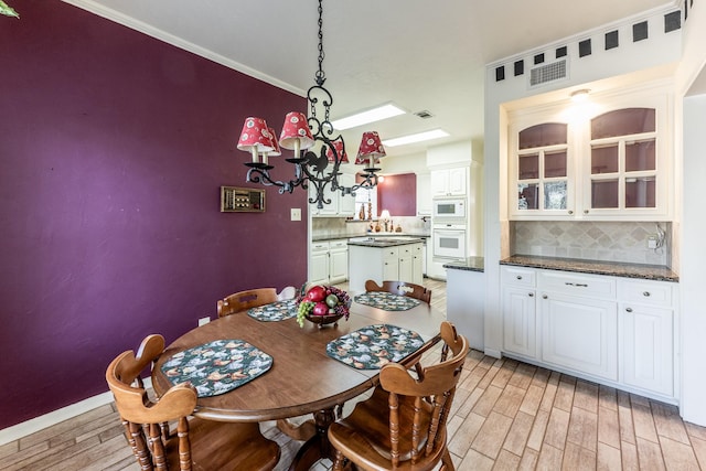 18 Village Hill Dr, Conroe, TX 77304 - dining room featuring light wood-type flooring