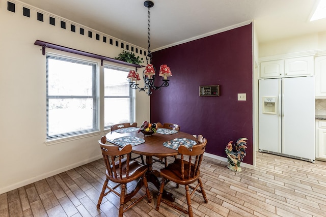 18 Village Hill Dr, Conroe, TX 77304 - dining space featuring a chandelier and baseboards