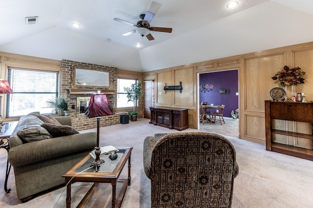 18 Village Hill Dr, Conroe, TX 77304 - living area with lofted ceiling, carpet floors, ceiling fan, a fireplace, and recessed lighting