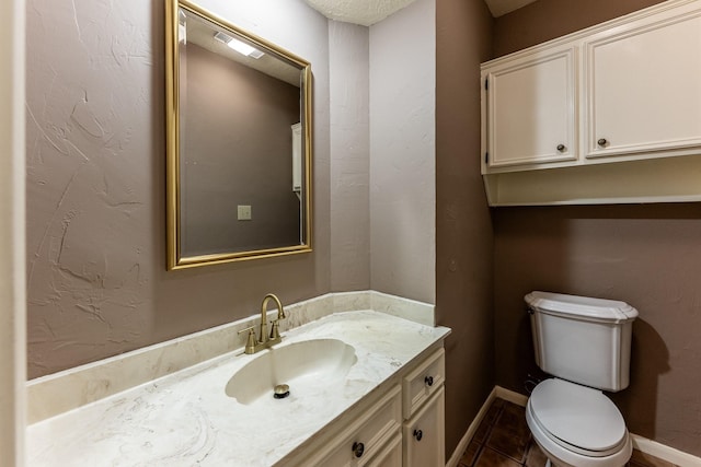 18 Village Hill Dr, Conroe, TX 77304 - bathroom with vanity, toilet, tile patterned flooring, and baseboards
