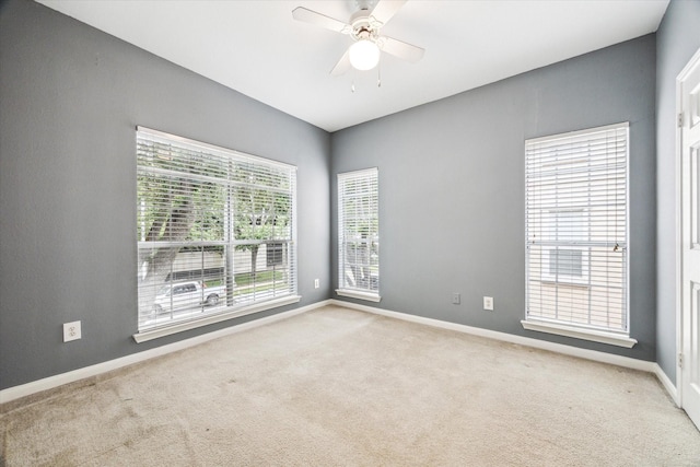 3231 Allen Pkwy Unit 6205, Houston, TX 77019 - empty room featuring carpet flooring, baseboards, and a ceiling fan