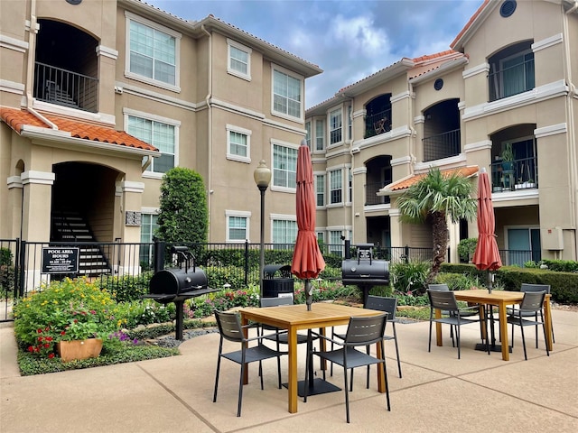 3231 Allen Pkwy Unit 6205, Houston, TX 77019 - view of patio featuring outdoor dining area and grilling area