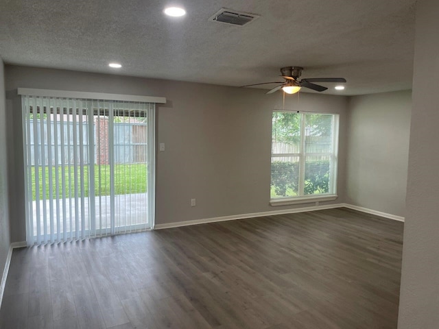 19414 Leafwood Ln, Houston, TX 77084 - empty room featuring wood finished floors, a ceiling fan, a textured ceiling, baseboards, and recessed lighting