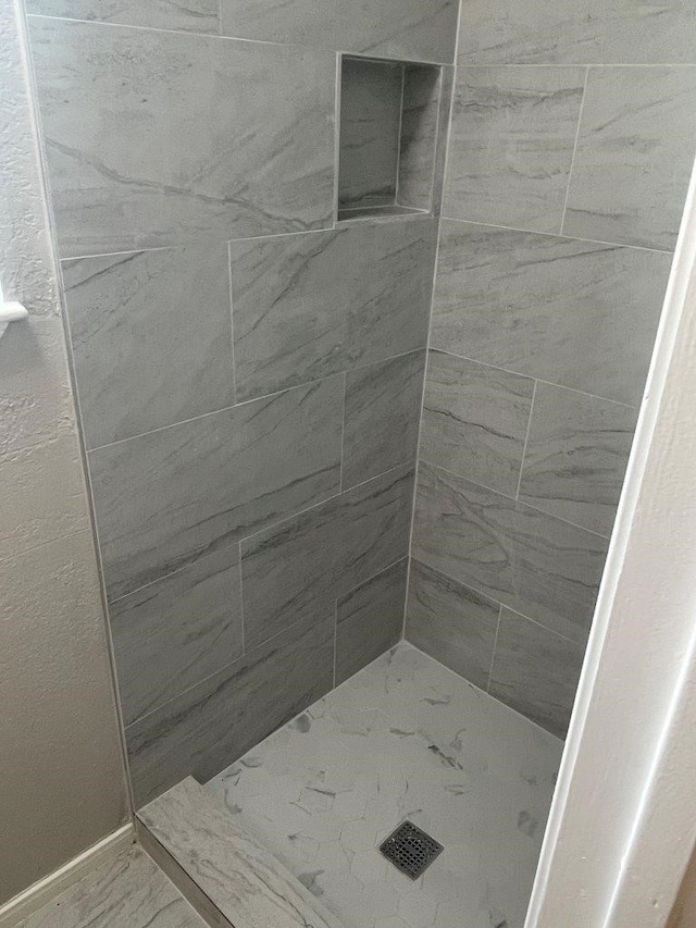 19414 Leafwood Ln, Houston, TX 77084 - full bath featuring a stall shower and marble finish floors