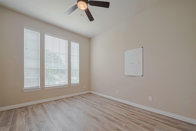 5442 Jackson Park Ln, Katy, TX 77494 - spare room featuring light wood-type flooring, baseboards, and a ceiling fan