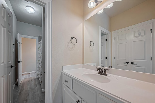 5442 Jackson Park Ln, Katy, TX 77494 - bathroom featuring vanity and wood finished floors