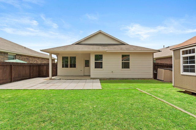 18061 Atwood Mill Dr, New Caney, TX 77357 - back of house featuring a patio area