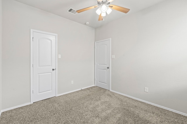 18061 Atwood Mill Dr, New Caney, TX 77357 - unfurnished room featuring carpet, a ceiling fan, and baseboards