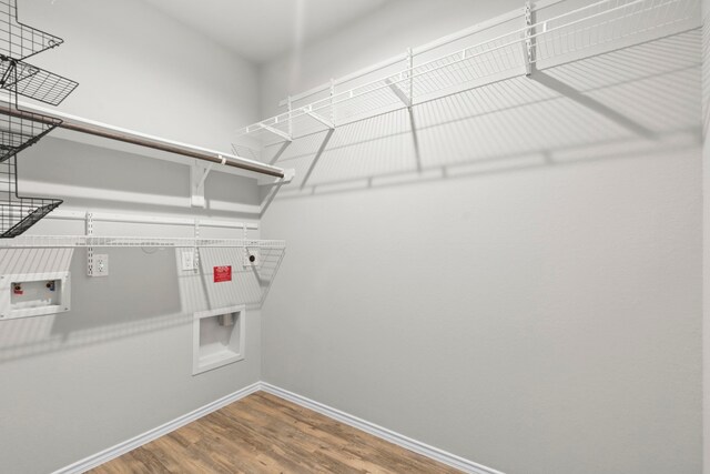 18061 Atwood Mill Dr, New Caney, TX 77357 - spacious closet with wood finished floors
