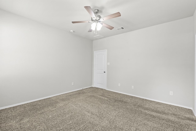 18061 Atwood Mill Dr, New Caney, TX 77357 - spare room featuring ceiling fan, carpet floors, and baseboards
