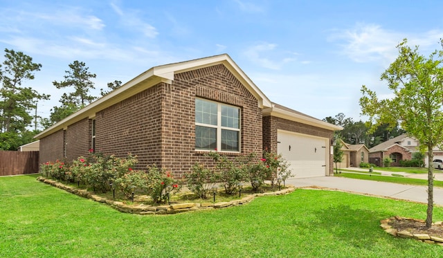 18061 Atwood Mill Dr, New Caney, TX 77357 - view of home's exterior featuring brick siding, an attached garage, and driveway