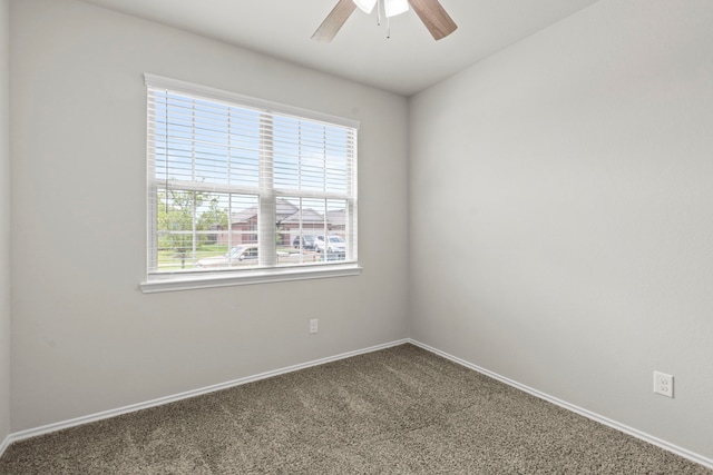 18061 Atwood Mill Dr, New Caney, TX 77357 - carpeted empty room with a ceiling fan and baseboards