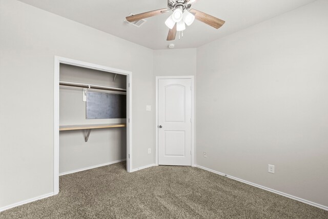18061 Atwood Mill Dr, New Caney, TX 77357 - unfurnished bedroom with carpet, baseboards, a closet, and a ceiling fan