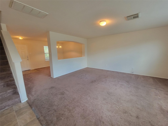 18214 Olive Leaf Dr, Houston, TX 77084 - carpeted empty room featuring stairway