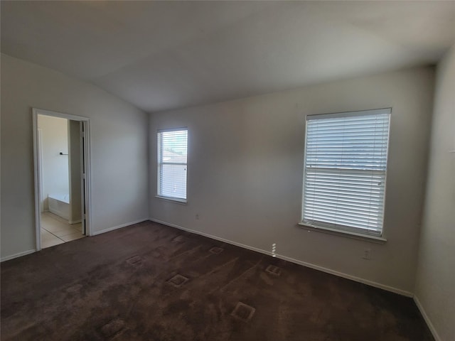 18214 Olive Leaf Dr, Houston, TX 77084 - carpeted spare room with vaulted ceiling and baseboards