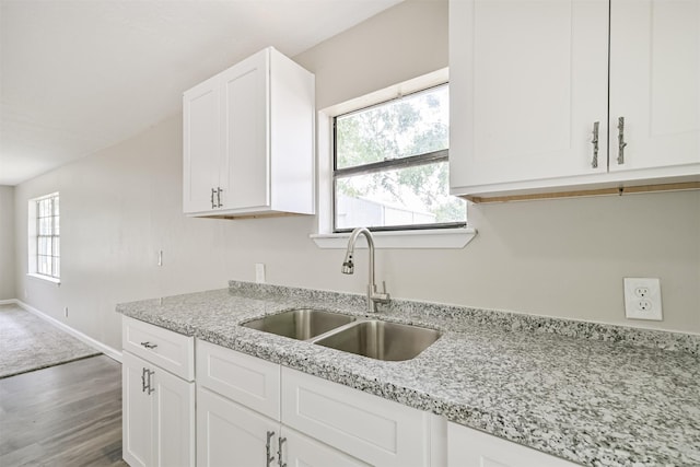 4803 W Bayshore Dr, Bacliff, TX 77518 - kitchen featuring a sink, white cabinetry, and light stone countertops
