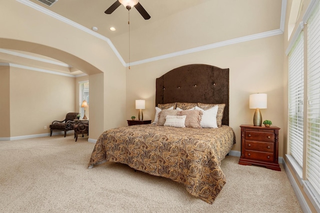 19023 Wild Thornberry Dr, Tomball, TX 77377 - bedroom featuring carpet, arched walkways, crown molding, baseboards, and ceiling fan