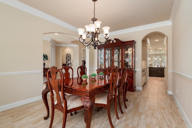 19023 Wild Thornberry Dr, Tomball, TX 77377 - dining space featuring arched walkways, a chandelier, crown molding, and baseboards