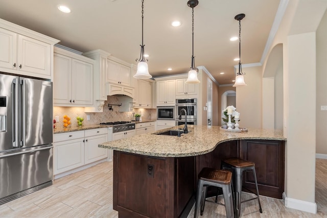 19023 Wild Thornberry Dr, Tomball, TX 77377 - kitchen with stainless steel appliances, tasteful backsplash, ornamental molding, a breakfast bar, and light stone counters