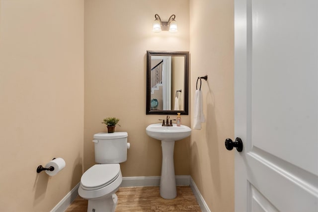 19023 Wild Thornberry Dr, Tomball, TX 77377 - bathroom featuring toilet and baseboards