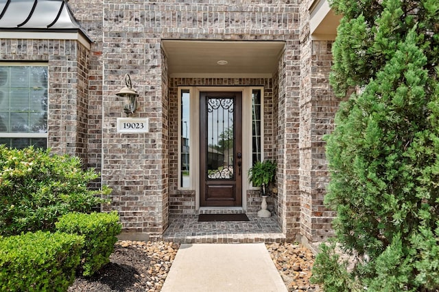 19023 Wild Thornberry Dr, Tomball, TX 77377 - property entrance with brick siding