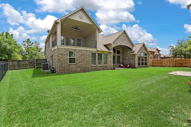 19023 Wild Thornberry Dr, Tomball, TX 77377 - back of house featuring a ceiling fan, brick siding, and central AC