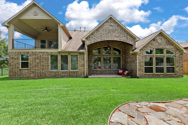 19023 Wild Thornberry Dr, Tomball, TX 77377 - rear view of property with ceiling fan, brick siding, a patio area, roof with shingles, and a balcony