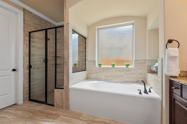 19023 Wild Thornberry Dr, Tomball, TX 77377 - bathroom featuring a garden tub, vanity, and a shower stall