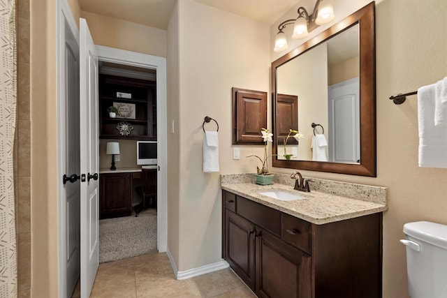 19023 Wild Thornberry Dr, Tomball, TX 77377 - full bath with vanity, toilet, tile patterned floors, and baseboards