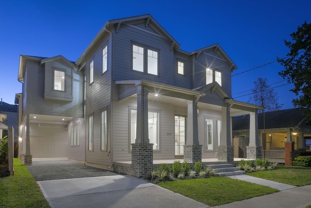 711 E 12th St, Houston, TX 77008 - view of front of property with covered porch and driveway