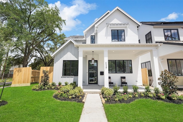 711 E 12th St, Houston, TX 77008 - modern inspired farmhouse featuring board and batten siding and covered porch