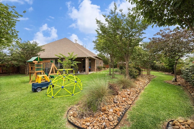 21307 Plum Gate Ct, Richmond, TX 77407 - view of yard with a playground