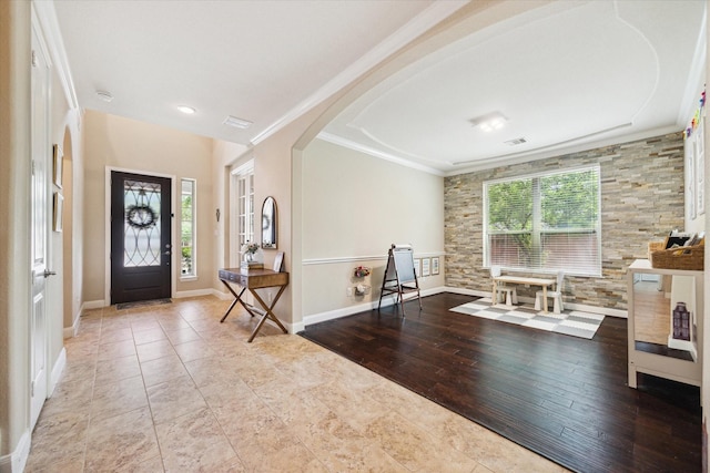 21307 Plum Gate Ct, Richmond, TX 77407 - entrance foyer featuring ornamental molding, arched walkways, baseboards, and tile patterned floors
