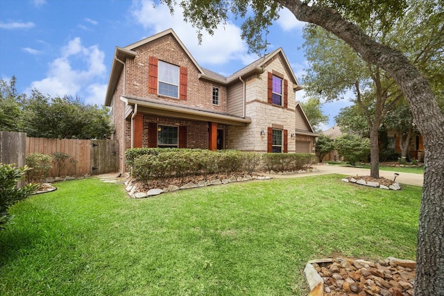 21307 Plum Gate Ct, Richmond, TX 77407 - traditional home featuring driveway, brick siding, stone siding, and an attached garage