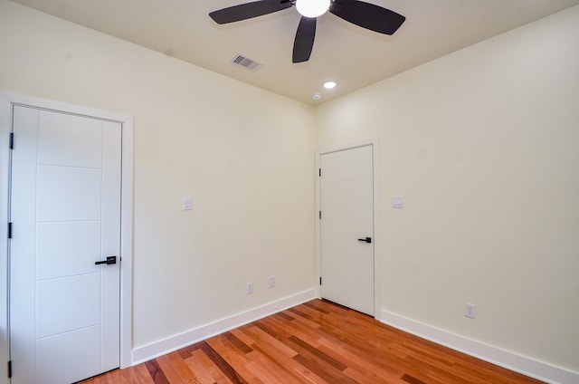 3626 Dreyfus St, Houston, TX 77021 - empty room with ceiling fan, light wood-type flooring, baseboards, and recessed lighting