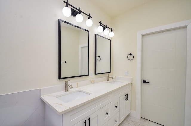 3626 Dreyfus St, Houston, TX 77021 - full bathroom featuring double vanity and marble finish flooring