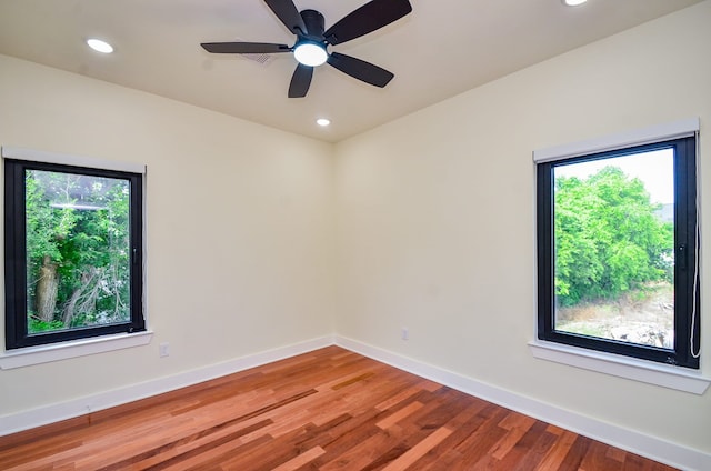3626 Dreyfus St, Houston, TX 77021 - spare room featuring plenty of natural light, wood finished floors, recessed lighting, baseboards, and a ceiling fan