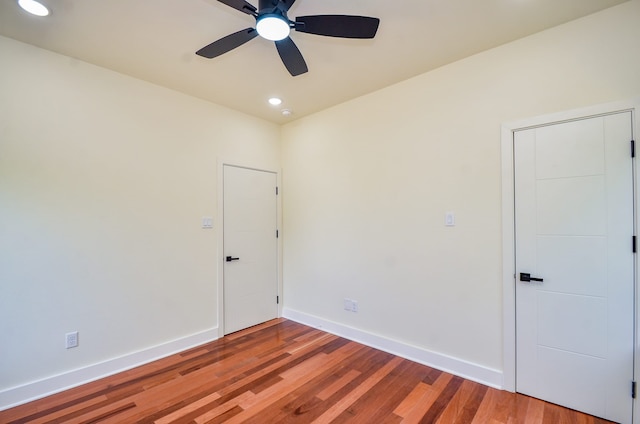3626 Dreyfus St, Houston, TX 77021 - spare room with a ceiling fan, wood finished floors, recessed lighting, and baseboards