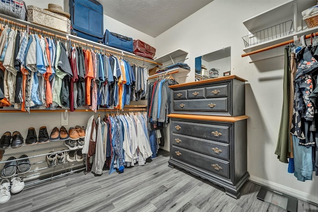 17815 Gables Bend Dr, Tomball, TX 77377 - spacious closet featuring wood finished floors