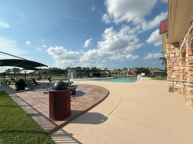 17815 Gables Bend Dr, Tomball, TX 77377 - community pool featuring a patio