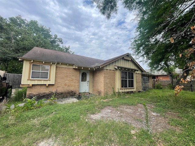 623 E Canino Rd, Houston, TX 77037 - ranch-style home featuring brick siding and roof with shingles