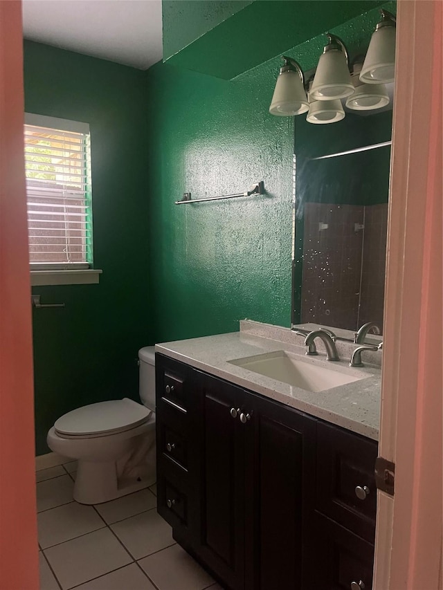 623 E Canino Rd, Houston, TX 77037 - bathroom with tile patterned flooring, vanity, and toilet