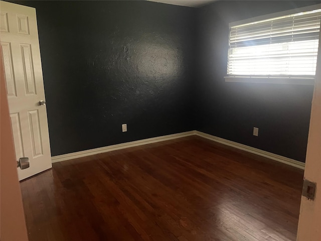 623 E Canino Rd, Houston, TX 77037 - spare room with wood finished floors and baseboards