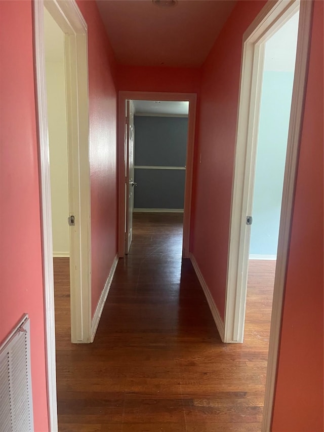623 E Canino Rd, Houston, TX 77037 - hallway featuring wood finished floors and baseboards