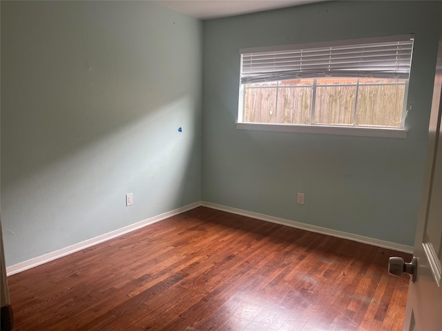 623 E Canino Rd, Houston, TX 77037 - unfurnished room with wood finished floors and baseboards