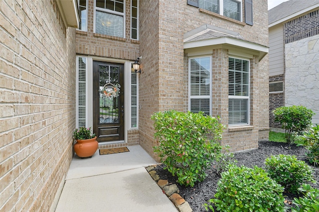 13705 Northline Lake Dr, Houston, TX 77044 - doorway to property featuring brick siding