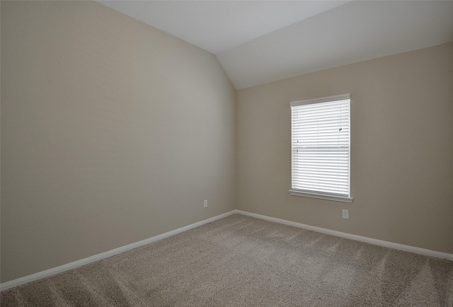 13705 Northline Lake Dr, Houston, TX 77044 - spare room featuring light colored carpet, baseboards, and lofted ceiling