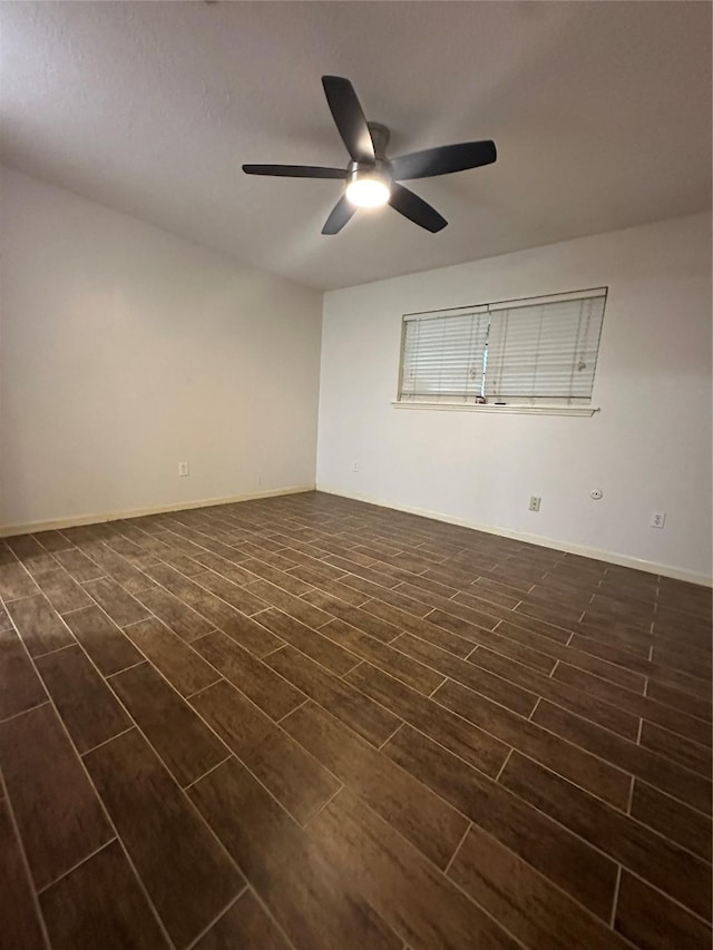2316 Buchanan Dr, Baytown, TX 77520 - unfurnished room with a ceiling fan, dark wood-style flooring, and baseboards
