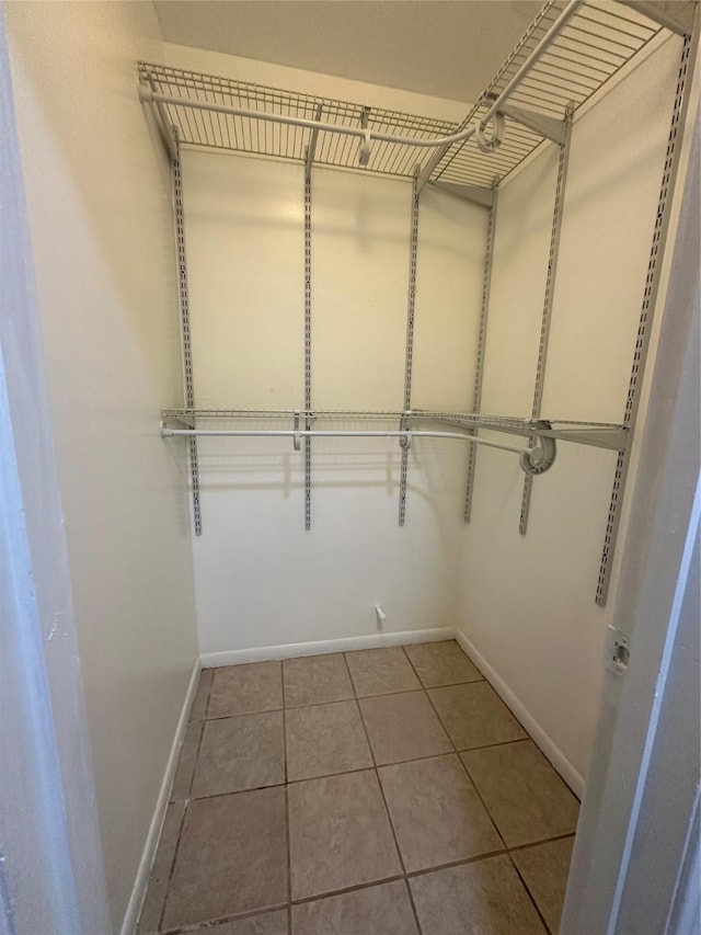 2316 Buchanan Dr, Baytown, TX 77520 - spacious closet with tile patterned floors